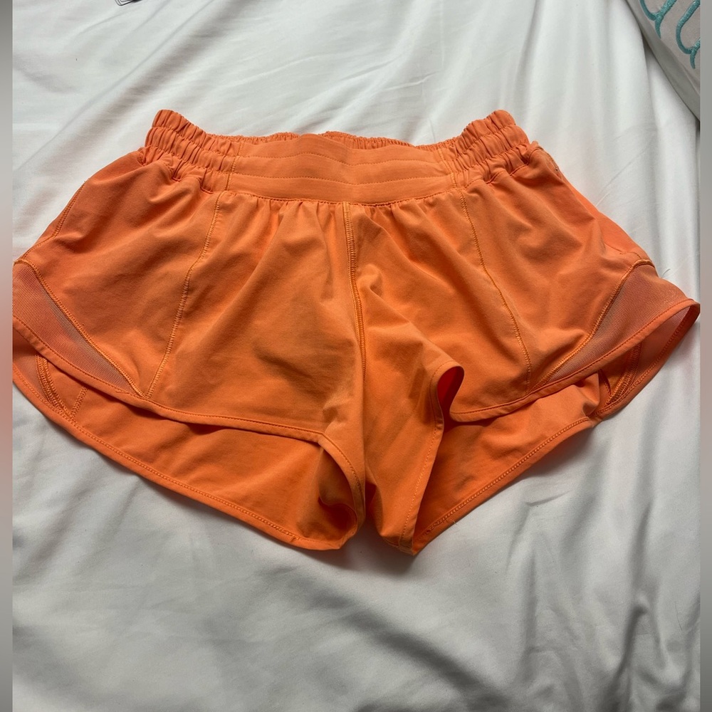 Lululemon Hotty Hot shorts 2.5 inch in size 4. Orange soda color